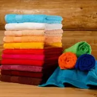 Полотенце махровое 500 г/м2  50*90 гладкокрашенное ярко зеленое Зеленый - фото