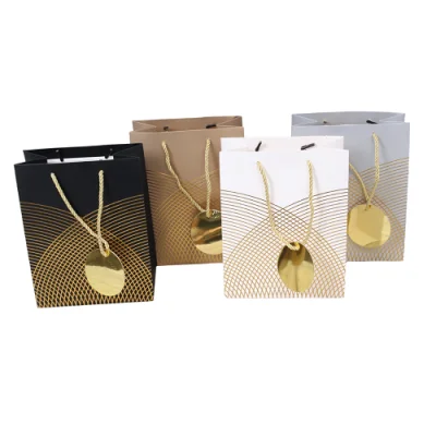 Пакет подарочный бумажный с ручками 18*32*10, арт. L357 Люкс c тиснением  - фото